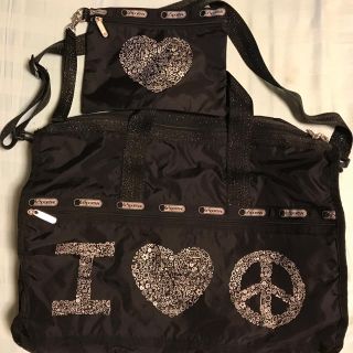 レスポートサック(LeSportsac)のレスポートサック ラージウィークエンダー ラブ＆ピース柄 黒×シルバー USED(ボストンバッグ)