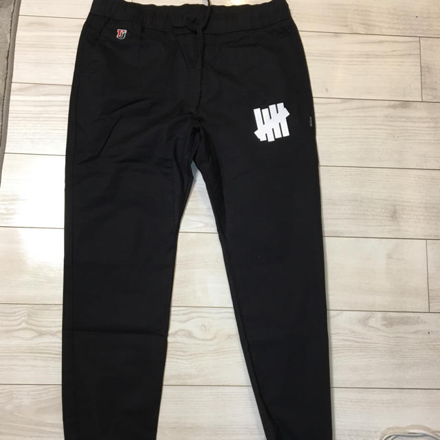 UNDEFEATED(アンディフィーテッド)のUndefeated track pants  メンズのパンツ(その他)の商品写真