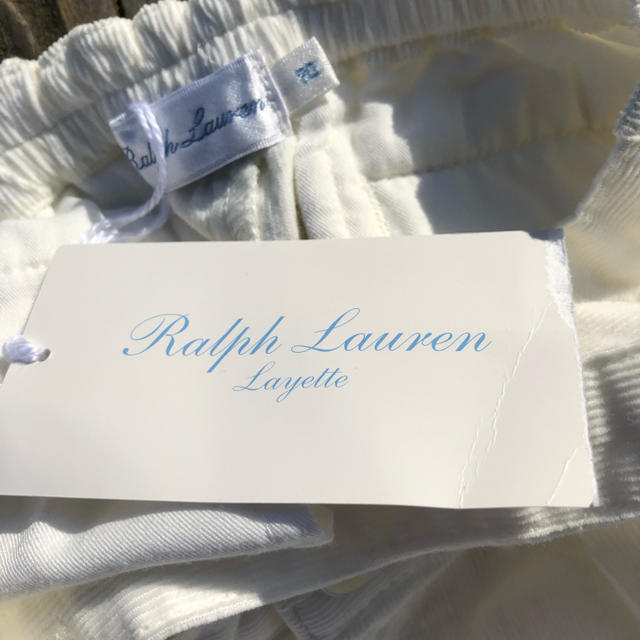 Ralph Lauren(ラルフローレン)の新品タグ付き★ラルフローレン ホワイト コーデュロイ サロペット キッズ/ベビー/マタニティのベビー服(~85cm)(ロンパース)の商品写真