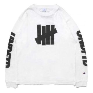 アンディフィーテッド(UNDEFEATED)のUNDEFEATED × Champion Logo L/SL TEE XL(Tシャツ/カットソー(七分/長袖))