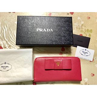 プラダ(PRADA)のプラダ 長財布 ラウンドファスナー サフィアーノ リボン ピンク 1M0506(財布)