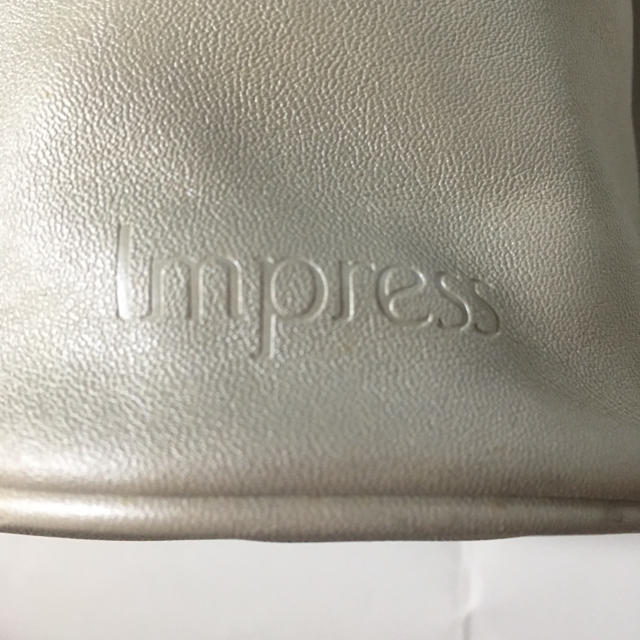 Impress(インプレス)のImpress 茶X白 バイカラー 巾着 ポーチ レディースのファッション小物(ポーチ)の商品写真