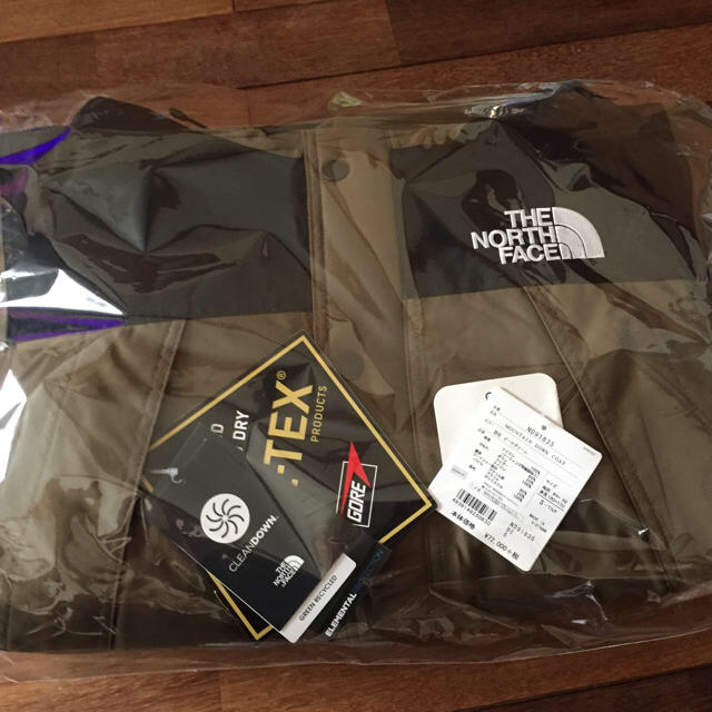 THE NORTH FACE(ザノースフェイス)の（Ｓ）ノースフェイス  マウンテンダウンコート新品未開封品 メンズのジャケット/アウター(ダウンジャケット)の商品写真