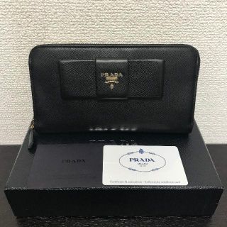 プラダ(PRADA)のプラダ　長財布　サフィアーノ　黒　リボンモチーフ　レザー(財布)