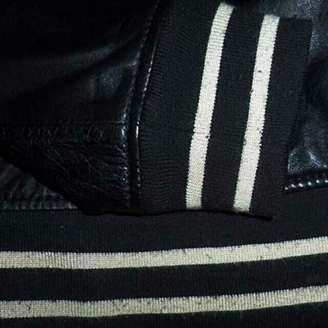 MEN'S BIGI(メンズビギ)のcollective.羊革 レザー スタジアム ジャンパー スタジャン 黒 03 メンズのジャケット/アウター(スタジャン)の商品写真