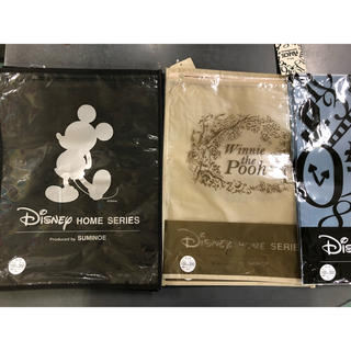 ディズニー(Disney)のDisney☆ミッキー・アリス・プーさん・既製カーテンの空袋１２枚(ショップ袋)