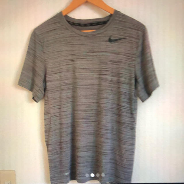 NIKE(ナイキ)のNIKE ドライフィット Tシャツ Mサイズ レディースのトップス(Tシャツ(半袖/袖なし))の商品写真