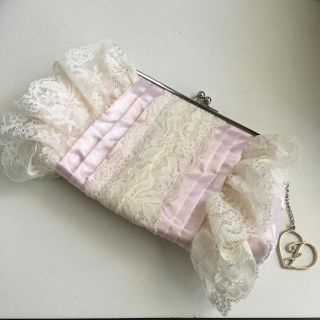 ジルスチュアート(JILLSTUART)の【送料込】ジルスチュアート ジル がま口 フリル ポーチ【中古】(ポーチ)