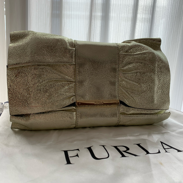 Furla(フルラ)の【初売り】♡FURLA♡ クラッチバッグ ゴールド レディースのバッグ(クラッチバッグ)の商品写真