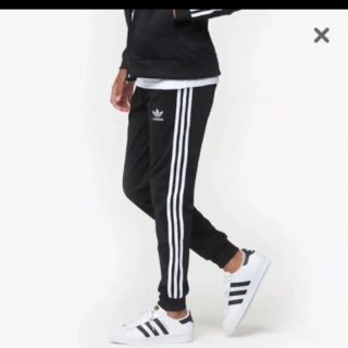 アディダス(adidas)の最安 adidas sst cuffed track pants(その他)