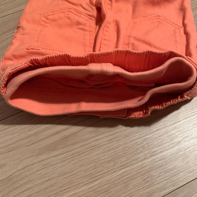 H&M(エイチアンドエム)のカラーデニム オレンジ キッズ/ベビー/マタニティのベビー服(~85cm)(パンツ)の商品写真