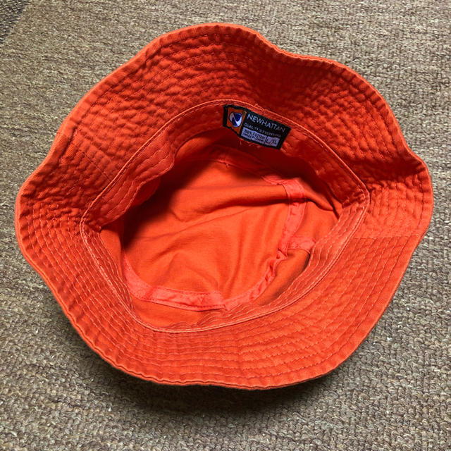 STUSSY(ステューシー)の新品 バケットハット 帽子 NEWHATTAN ニューハッタン 無地 オレンジ メンズの帽子(ハット)の商品写真