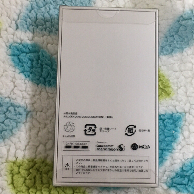 LG Electronics(エルジーエレクトロニクス)の新品  JOJO L-02K(jojo White) 一括購入品 スマホ/家電/カメラのスマートフォン/携帯電話(スマートフォン本体)の商品写真