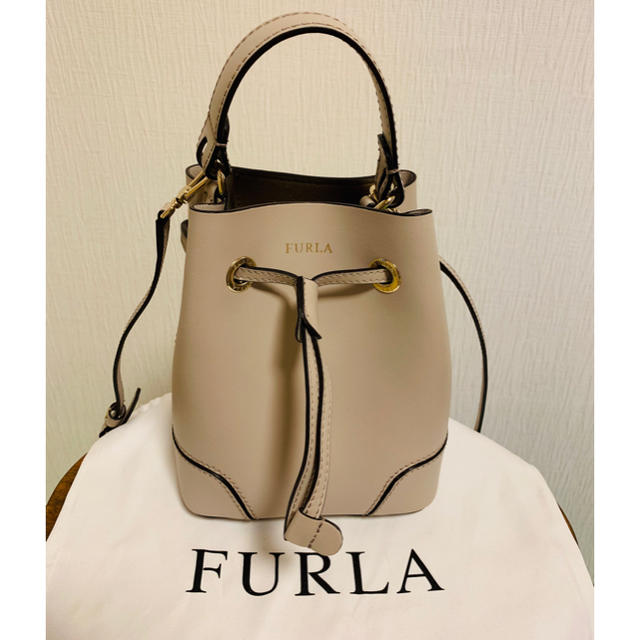 2019.04.30発行
![Furla - FURLAフルラ 巾着型ミニバッグ アイボリー 未使用品の通販 by