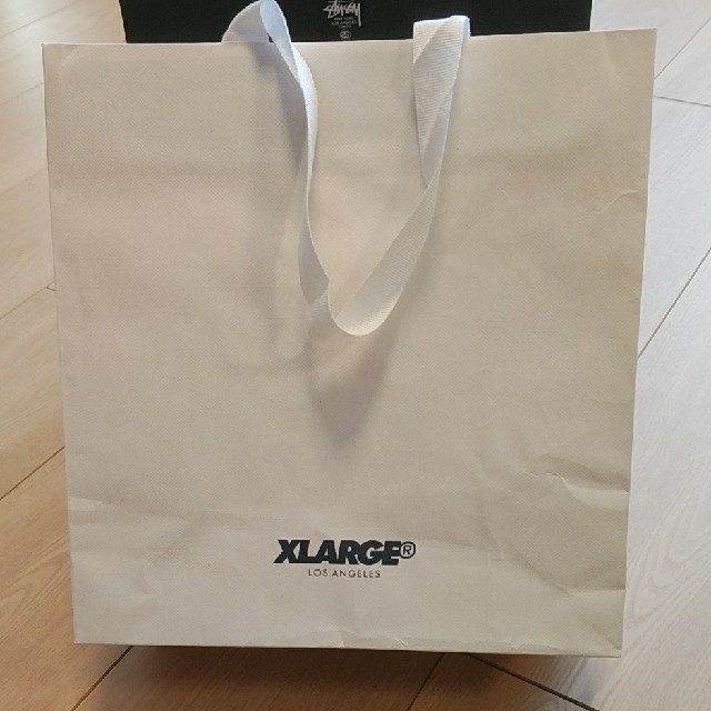 XLARGE(エクストララージ)のXLARGE  STUSSY  紙袋２枚 レディースのバッグ(ショップ袋)の商品写真