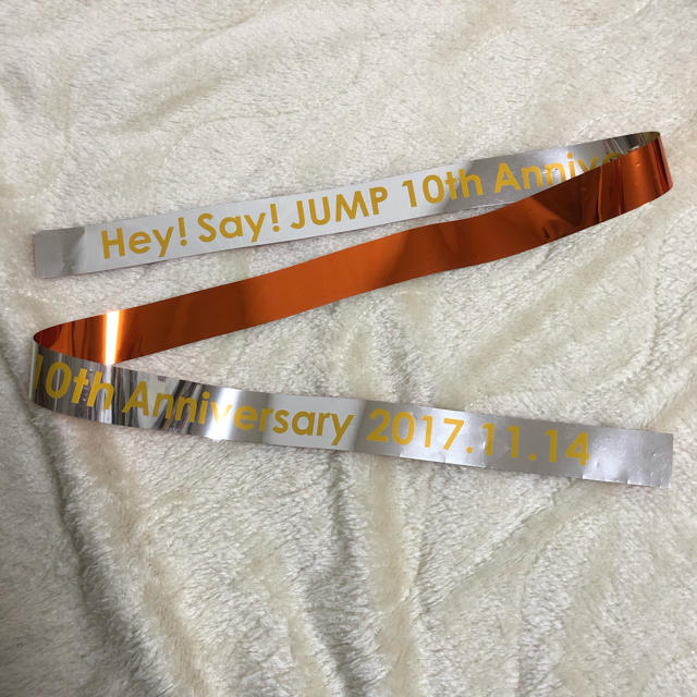 Hey! Say! JUMP(ヘイセイジャンプ)のHey! Say! JUMP 10周年イベント 銀テ オレンジ エンタメ/ホビーのタレントグッズ(アイドルグッズ)の商品写真