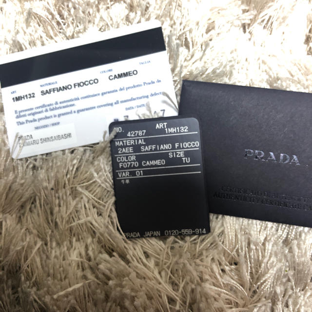 PRADA(プラダ)のPRADA 財布 サフィアーノ 長財布 ベージュ リボン 新品 美品 ブランド レディースのファッション小物(財布)の商品写真