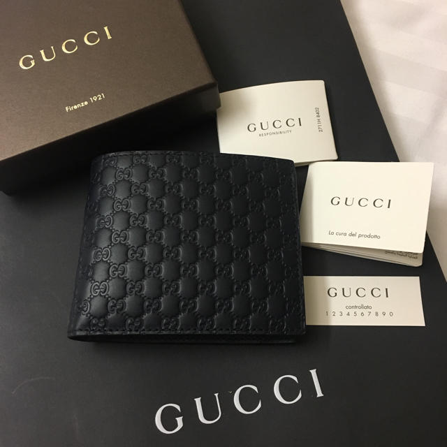 爆買いセール Gucci - グッチ グッチシマ 2つ折札入れ 二つ折り財布
