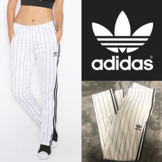 アディダス(adidas)のトラックパンツ(カジュアルパンツ)