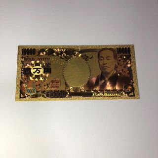 黄金に輝く 金色紙幣。 長財布へ。(貨幣)