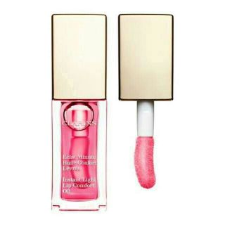 クラランス(CLARINS)のCLARINS　コンフォート リップオイル #04 キャンディー CANDY 
(リップグロス)