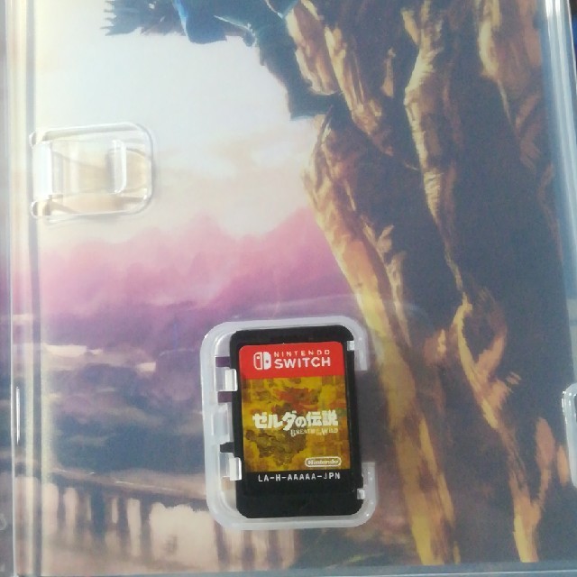Nintendo Switch(ニンテンドースイッチ)のゼルダの伝説 ブレスオブザワイルド 限定ガイドブック付 美品 SWITCH エンタメ/ホビーのゲームソフト/ゲーム機本体(携帯用ゲームソフト)の商品写真