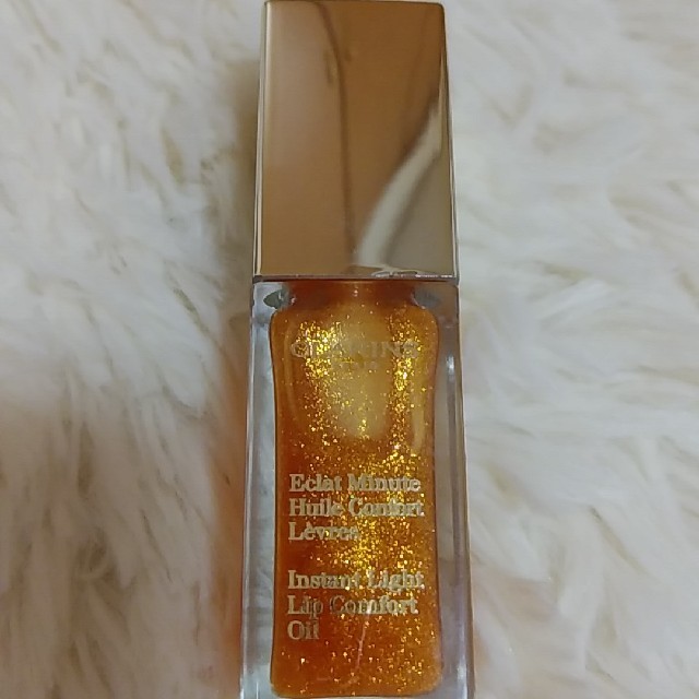 CLARINS(クラランス)のクラランス　リップオイル　限定品　ラメ入りゴールド コスメ/美容のベースメイク/化粧品(リップグロス)の商品写真