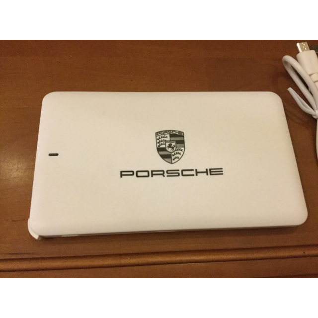 Porsche(ポルシェ)のnatsugiri様専用 ポルシェ 非売品 モバイルバッテリー スマホ/家電/カメラのスマートフォン/携帯電話(バッテリー/充電器)の商品写真