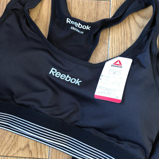 Reebok(リーボック)の新品 リーボック  M セットアップ 黒 レギンス タイツ ランニング ヨガ  スポーツ/アウトドアのトレーニング/エクササイズ(トレーニング用品)の商品写真