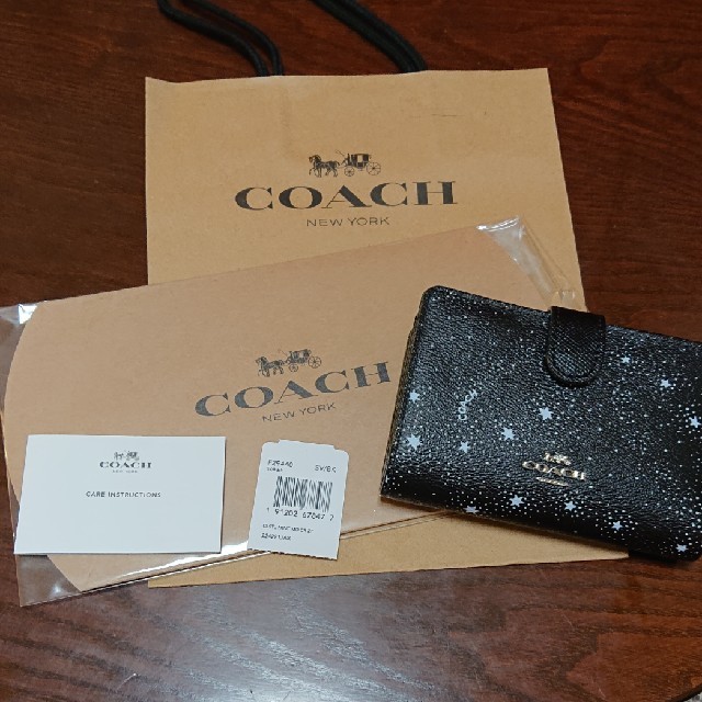 COACH(コーチ)のCOACH／コーチ 星柄二つ折り財布 レディースのファッション小物(財布)の商品写真