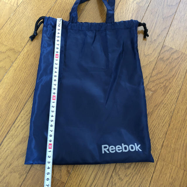 Reebok(リーボック)の新品 未使用 リーボック  袋 エコ ナイロン 手提げ シューズ入れ 巾着 レディースのファッション小物(ポーチ)の商品写真