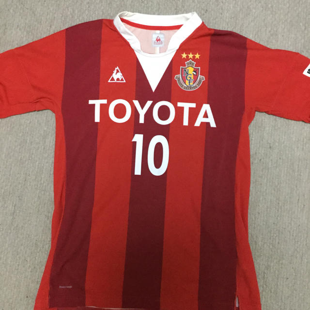 le coq sportif(ルコックスポルティフ)の名古屋グランパス オーセンティックユニフォーム スポーツ/アウトドアのサッカー/フットサル(ウェア)の商品写真