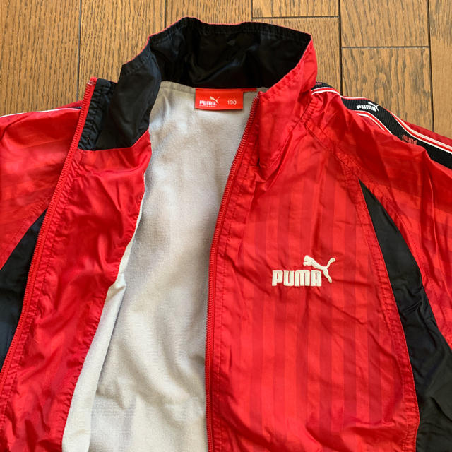 PUMA(プーマ)の【値引き】PUMA  プーマ 130㎝  レッド ウインドブレーカ キッズ/ベビー/マタニティのキッズ服男の子用(90cm~)(ジャケット/上着)の商品写真