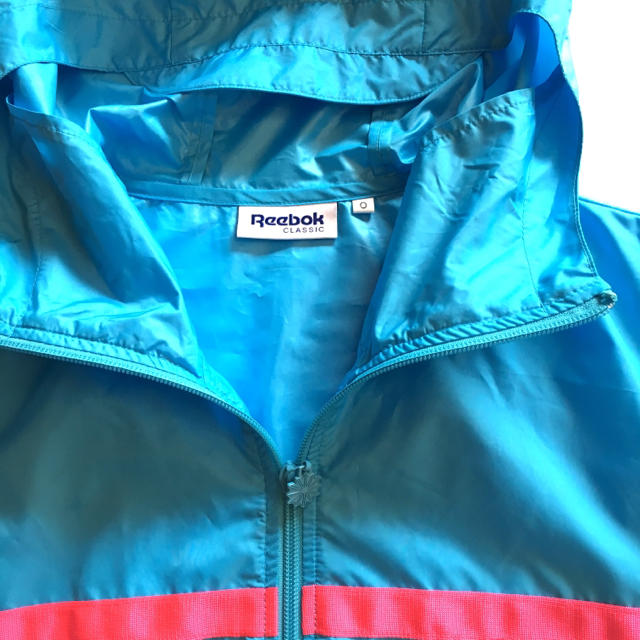 Reebok(リーボック)のReebok リーボック メンズ ウィンドブレーカー ジャンバー 水色 蛍光 メンズのジャケット/アウター(ナイロンジャケット)の商品写真