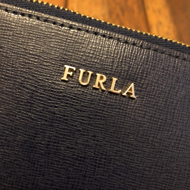 Furla(フルラ)のFURLA紺色ポーチ レディースのファッション小物(ポーチ)の商品写真