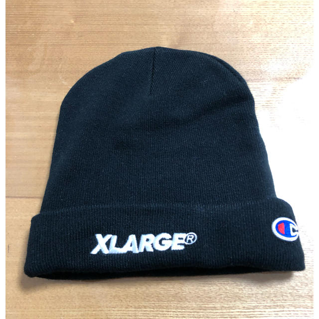 XLARGE(エクストララージ)の【新品】XLARGE Champion コラボ ニット帽 ブラック メンズの帽子(ニット帽/ビーニー)の商品写真