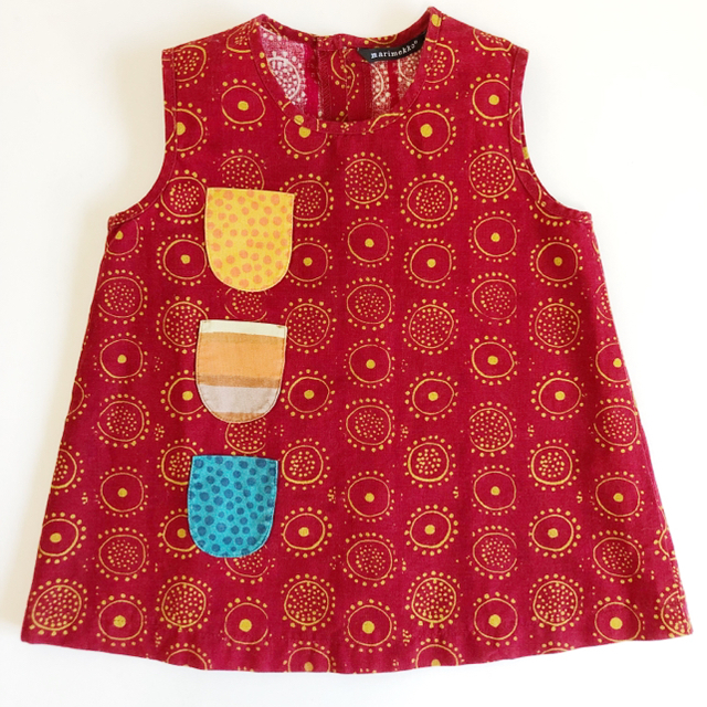 marimekko(マリメッコ)のマリメッコ  ワンピース ハッピードレス 赤 イロイネンタッキ キッズ/ベビー/マタニティのベビー服(~85cm)(ワンピース)の商品写真