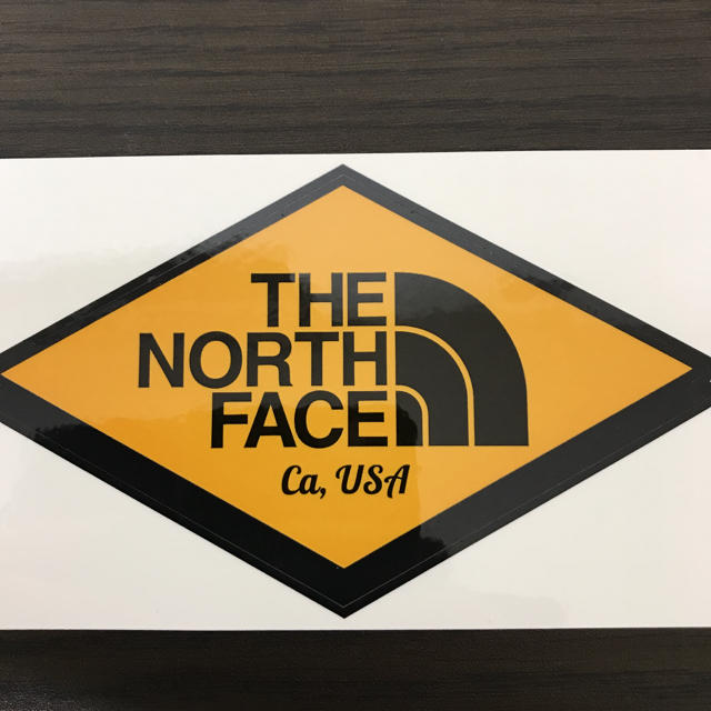 THE NORTH FACE(ザノースフェイス)の【縦7.5cm横12.8cm】THE NORTH FACE ステッカー 自動車/バイクのバイク(ステッカー)の商品写真