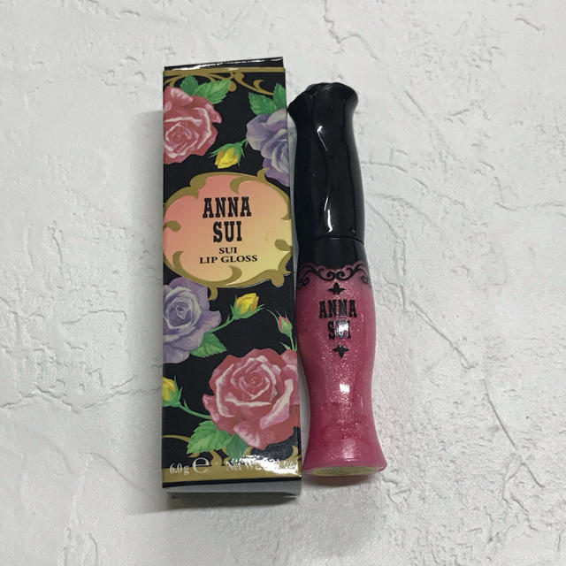 ANNA SUI(アナスイ)の値下げ【ANNA SUI★アナスイ】リップグロス 303 コスメ/美容のベースメイク/化粧品(リップグロス)の商品写真