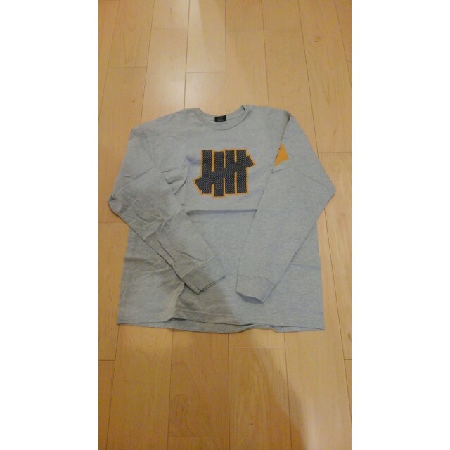 UNDEFEATED(アンディフィーテッド)のUNDEFEATED 　ロンT  XL　グレー メンズのトップス(Tシャツ/カットソー(七分/長袖))の商品写真