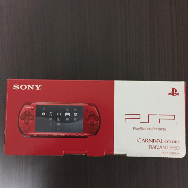 SONY(ソニー)のPSP 新品 未開封 レッド 赤 エンタメ/ホビーのゲームソフト/ゲーム機本体(携帯用ゲーム機本体)の商品写真