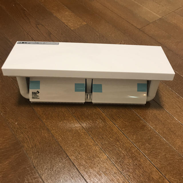  新品未使用！LIXIL 棚付2連紙巻器/トイレットペーパーホルダー インテリア/住まい/日用品の収納家具(トイレ収納)の商品写真