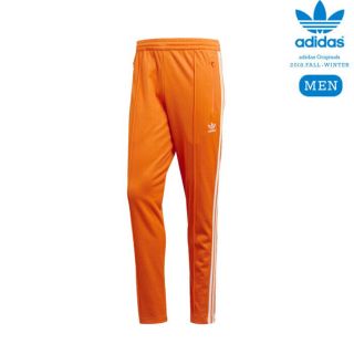 アディダス(adidas)のadidasトラックパンツオレンジ(ジャージ)