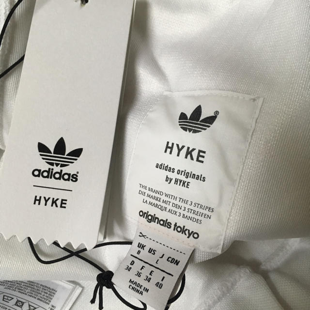 HYKE(ハイク)の新品タグ付きHYKE ADIDAS トラックパンツ サイズL ハイク アディダス メンズのパンツ(その他)の商品写真