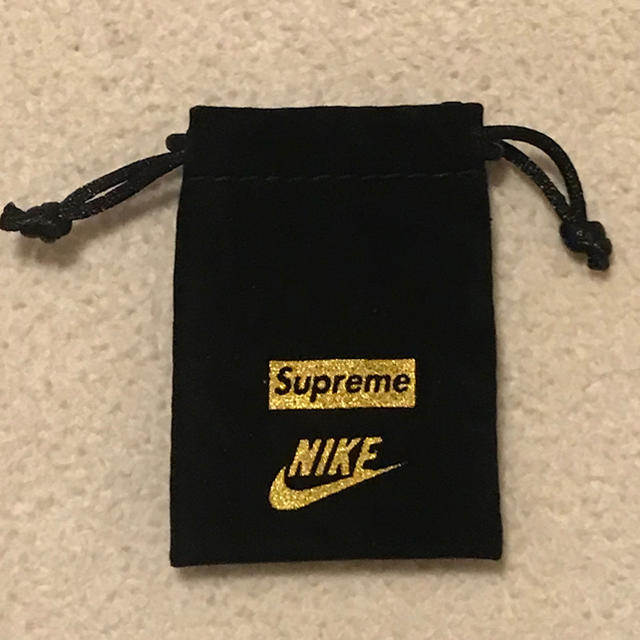 nike supreme earring