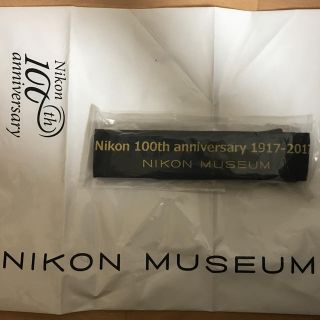 ニコン(Nikon)のニコン［希少］100周年記念ストラップ  ニコンミュージアム限定品 (デジタル一眼)