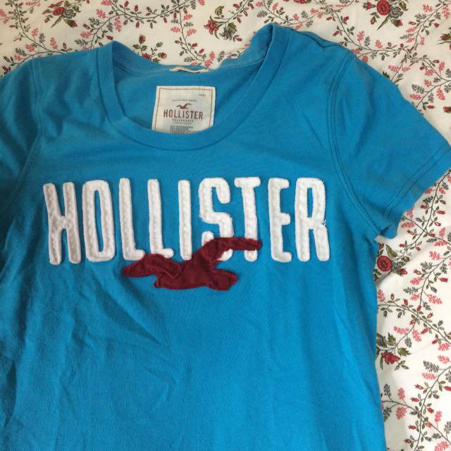 Hollister(ホリスター)のブルーのホリスター レディースのトップス(Tシャツ(半袖/袖なし))の商品写真