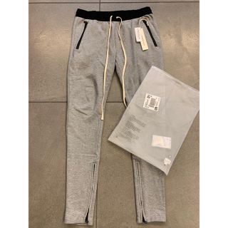 フィアオブゴッド(FEAR OF GOD)のFOG Essentials Sweatpants ジップ グレーMサイズ(その他)