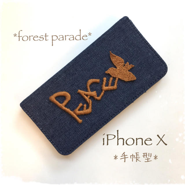 mina perhonen(ミナペルホネン)のフォレストパレード*iPhone X*手帳型 ハンドメイドのスマホケース/アクセサリー(スマホケース)の商品写真