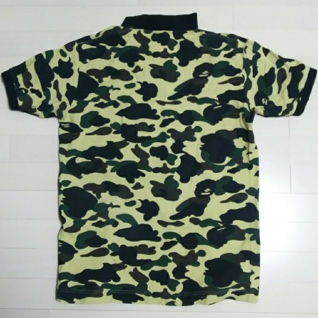 A BATHING APE(アベイシングエイプ)のアベイシングエイプ イエローカモ ポロシャツ Lサイズ メンズのトップス(ポロシャツ)の商品写真